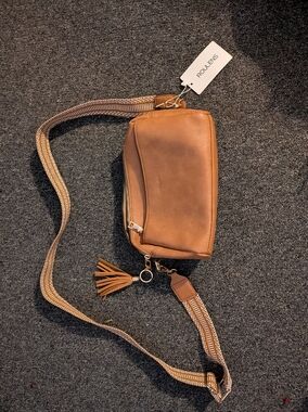 Roulens Caramel Leather Crossbody Bag with Tassel and Woven Strap